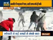 Intense cold wave grips North India, tourists enjoy snowfall at mountains