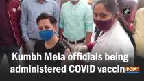 Kumbh Mela officials being administered COVID vaccine