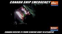 US, Canada rescue 31 from sinking boat in Atlantic