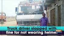 Truck driver slapped with fine for not wearing helmet