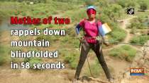	Mother of two rappels down mountain blindfolded in 58 seconds