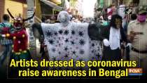 Artists dressed as coronavirus raise awareness in Bengal