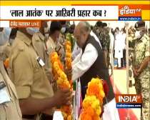 Amit Shah attends wreath-laying ceremony of security personnel martyred in the Naxal attack, in Jagdalpur