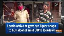 Locals arrive at govt-run liquor shops to buy alcohol amid COVID lockdown