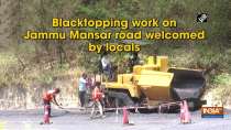 Blacktopping work on Jammu Mansar road welcomed by locals