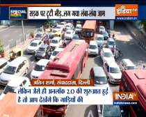 Special News | Delhi sees traffic jams, metro entry curbs as city begins 