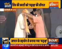 CM Yogi Adityanath felicitates PM Modi at Banaras Hindu University ground in Varanasi