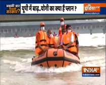Abki Baar Kiski Sarkar | UP CM Yogi Adityanath inspects flood-affected areas on boat