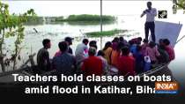Teachers hold classes on boats amid flood in Bihar