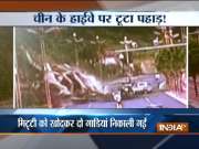 Landslides block road in China, watch video