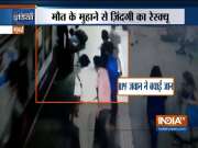 RPF jawan rescues a women who slipped off from a running train in Mumbai