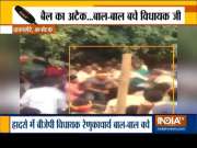 Bull attacks BJP MLA Renukacharya in Karnataka's Davanagere