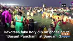 Devotees take holy dip on occasion of 'Basant Panchami' at Sangam Ghat