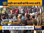 People hold protest against the women sit-in protest against CAA in Shaheen Bagh, Delhi