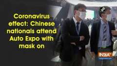 Coronavirus effect: Chinese nationals attend Auto Expo with mask on