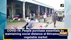 People purchase essentials by maintaining social distance at Shivamogga's vegetable market