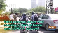 Police personnel ensure strict checking at Delhi-UP border amid COVID-19 lockdown