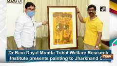 Dr Ram Dayal Munda Tribal Welfare Research Institute presents painting to Jharkhand CM