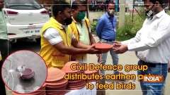 Civil Defence group distributes earthen pots to feed birds
