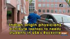 Indian origin physicians distribute laptops to needy students in USA's Rockville