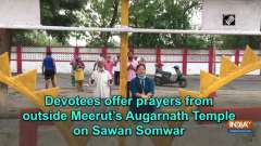 Devotees offer prayers from outside Meerut's Augarnath Temple on Sawan Somwar