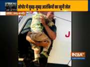 Police rescues 3-year-old kid during the terrorist attack in Sopore