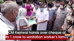 CM Kejriwal hands over cheque of Rs 1 crore to sanitation worker's family