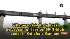 Villagers risk their lives by crossing river on 60-ft-high canal in Odisha's Ganjam