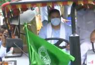 Bharat Bandh: RJD leader Tejashwi Yadav drives a tractor in Patna against farm Bills