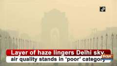 Layer of haze lingers Delhi sky, air quality stands in 'poor' category