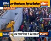 'Delhi Chalo': Farmers violently pull truck with a tractor at Tikri border