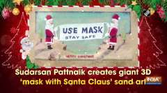Sudarsan Pattnaik creates giant 3D 'mask with Santa Claus' sand art