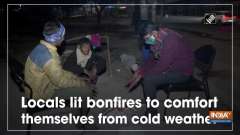 Locals lit bonfires to comfort themselves from cold weather