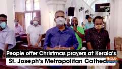 People offer Christmas prayers at Kerala's St. Joseph's Metropolitan Cathedral