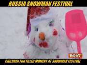 Russians enjoy winter weather at snowman festival
