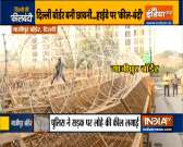 Iron bars hooked between barriers, makeshift wall created at Singhu border