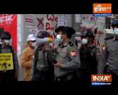 Yangon protesters use cars to block security forces