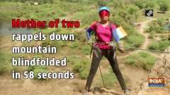 	Mother of two rappels down mountain blindfolded in 58 seconds