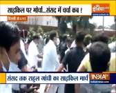 Congress leader Rahul Gandhi and other Opposition leaders ride bicycles to the Parliament