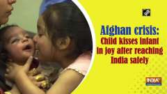 Afghan crisis: Child kisses infant in joy after reaching India safely