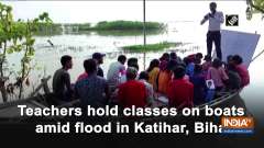 Teachers hold classes on boats amid flood in Bihar's Katihar