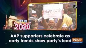 Delhi election results: AAP supporters celebrate as early trends show party's lead